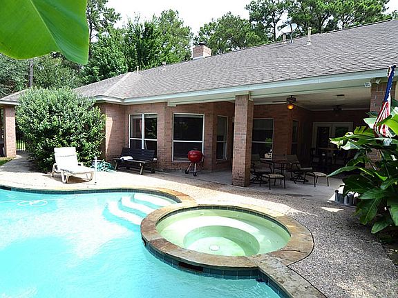 A view of the back of the house and patio space. Imagine the outdoor fun!
