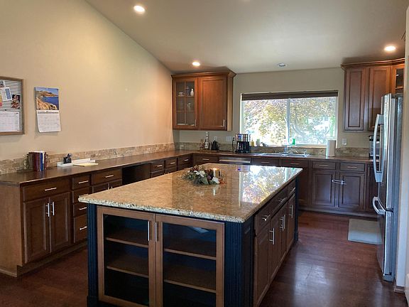 Large granite countertops and modern appliances