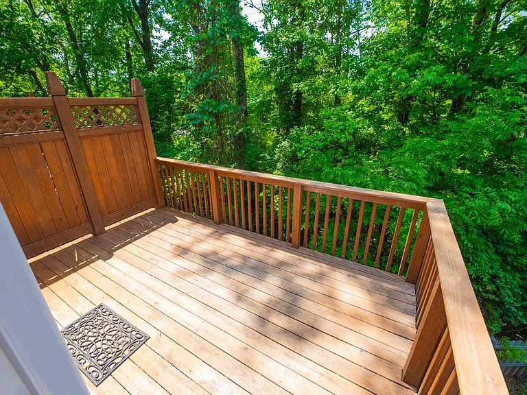 Very large private patio that allows grilling and other amenities. Notice the privacy and relaxing view of the lush forest.