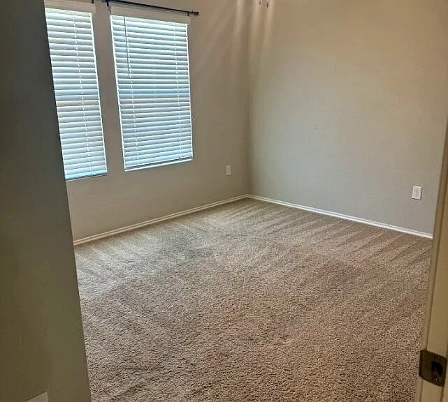 Bedroom 3: Bright bedroom with flexible use for children, guests, roommates or homeschool setup.