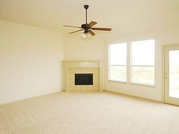 Large family room overlooking backyard