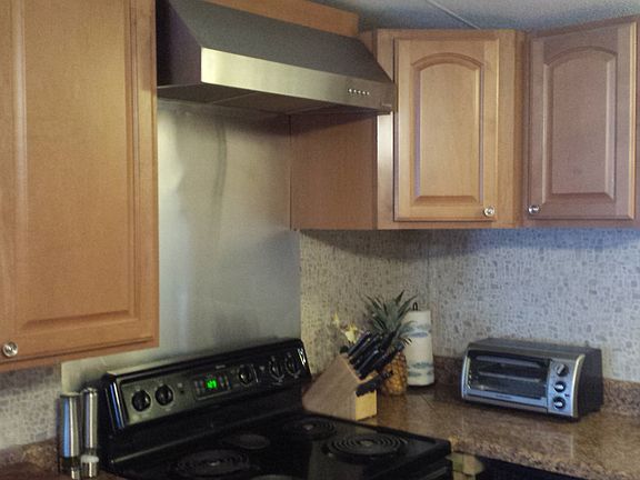 stainless hood and backsplash