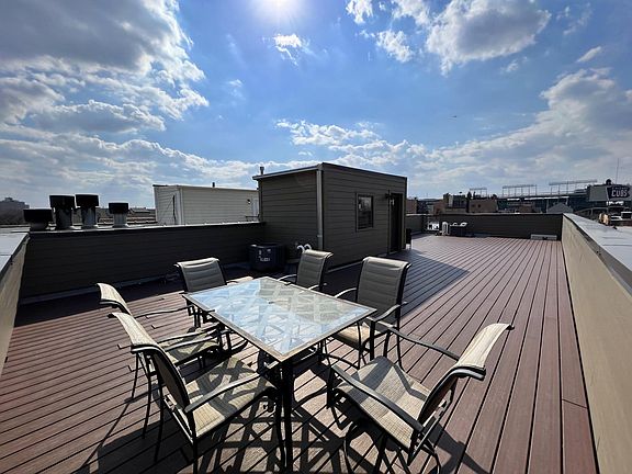 Private Rooftop Terrace with views of Wrigley Field in the background
