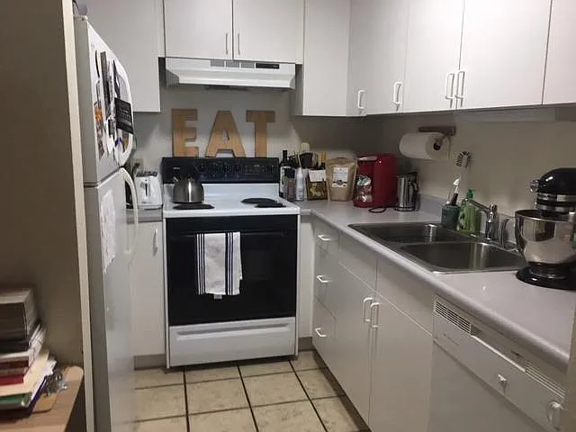 Abundant cupboard storage, nicely sized prep areas.