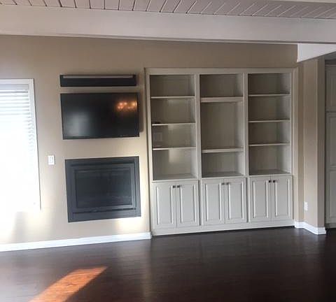 living room, installed TV and Sonos soundbar
