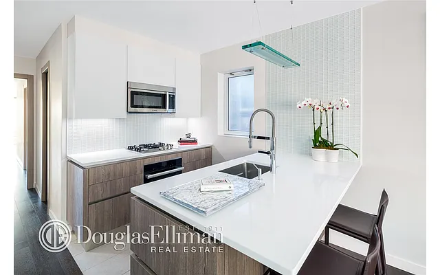 Sold by Douglas Elliman | media 23
