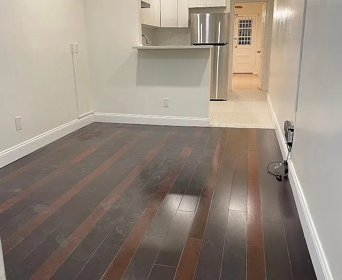 Living room that can comfortable fit in a small couch and TV/bookshelves