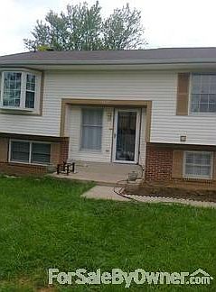 Front of the house with bay window.