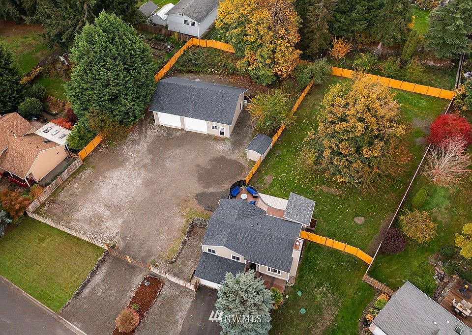 ~.74 acre lot with house, shop and storage shed. 