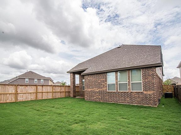 Check out the large back yard with a sprinkler system for all the yard.