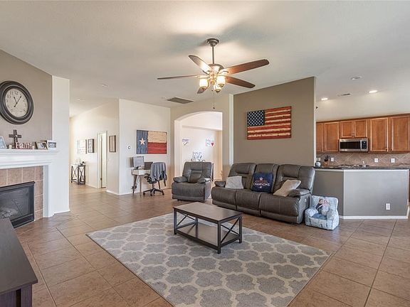 Living room is open to the kitchen and dining room.