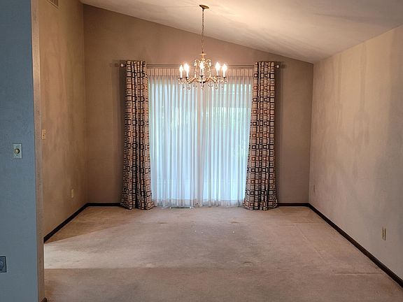 Dining room with sliding doors leading to back porch.