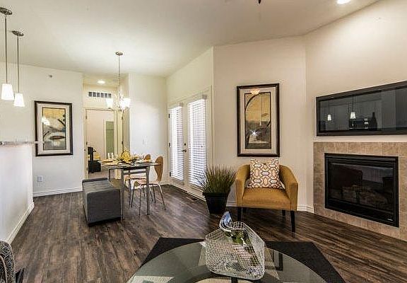 Living room, dining room, and kitchen have Shaw LPV flooring
