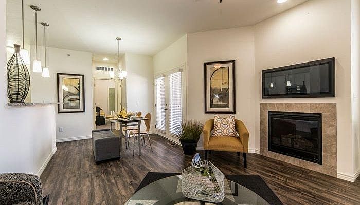 Living room, dining room, and kitchen have Shaw LPV flooring