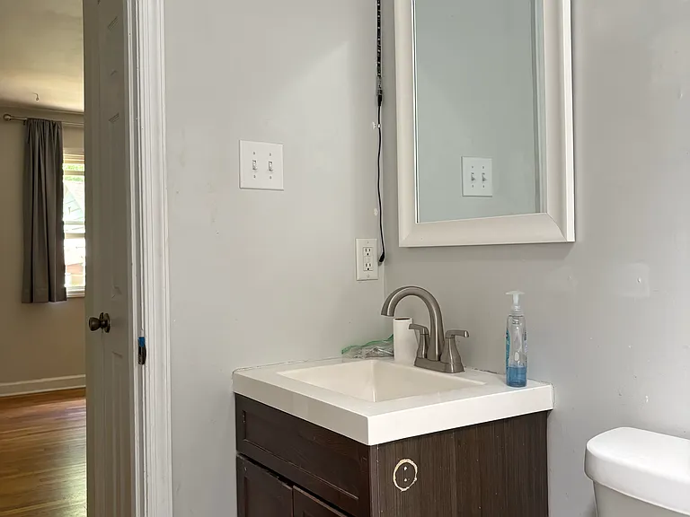 bathroom vanity and mirror