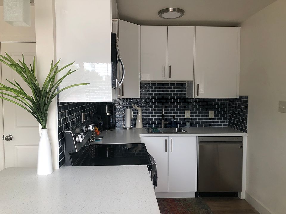 Furnished kitchen in the same building. Same great amenities in the available unit--dishwasher, disposal, self-cleaning electric range.