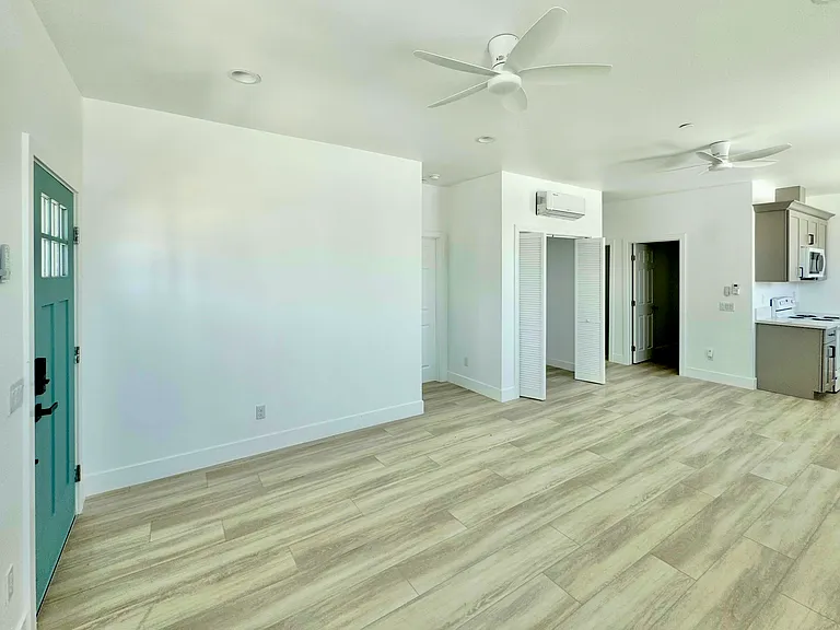 Access to laundry closet and half bathroom from the living space