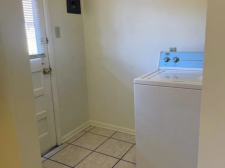 Front door opens to 2 dedicated parking spaces