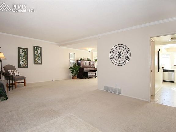 Living room open to kitchen and dining