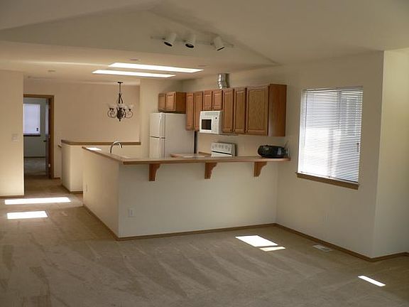 Open concept, bright, cheerful, lots of natural light.