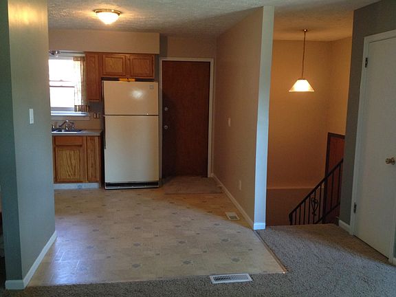 Livingroom looking toward entrance and kitchen