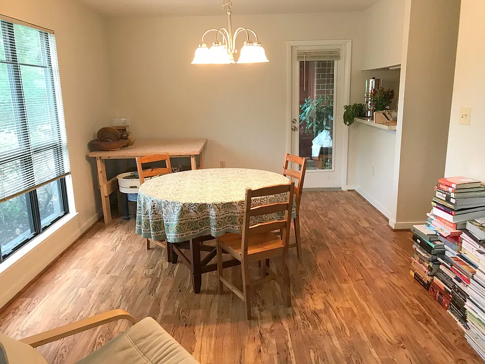 Dining area with front balcony access