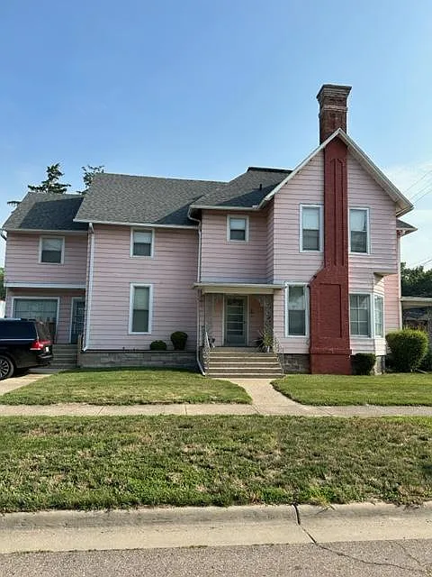 House on the corner of South Westnedge Ave. and Axtell Street. Parking on the side of house.