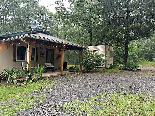Front of cottage and storage shed