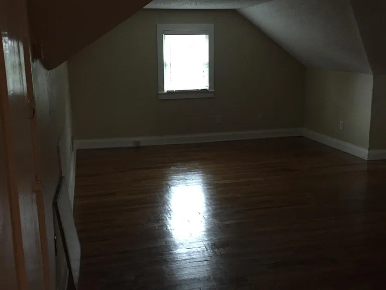 Great Room seating area with cable connection and AC vent on wall