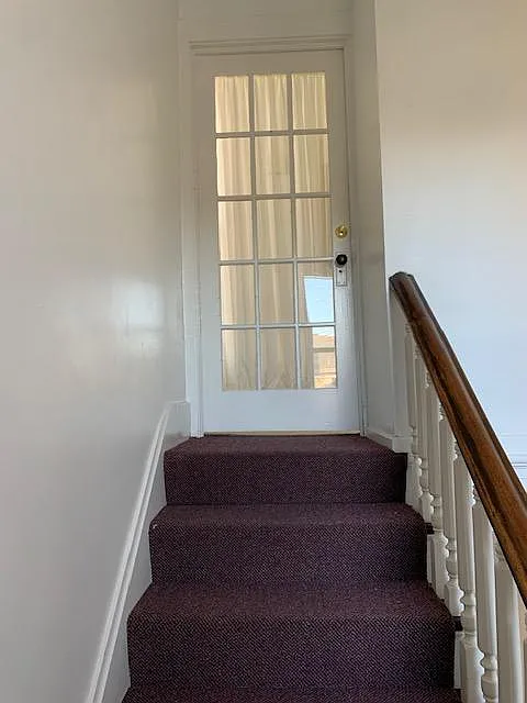 2nd Floor Entrance--12 steps from 1st floor to stairwell landing; 7 steps from landing to apartment entrance