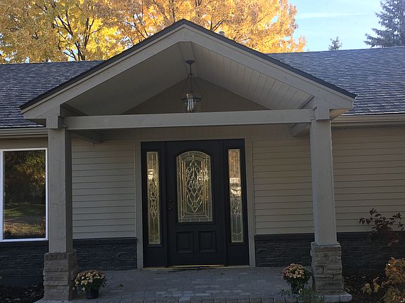 Paver porch & stone pillars