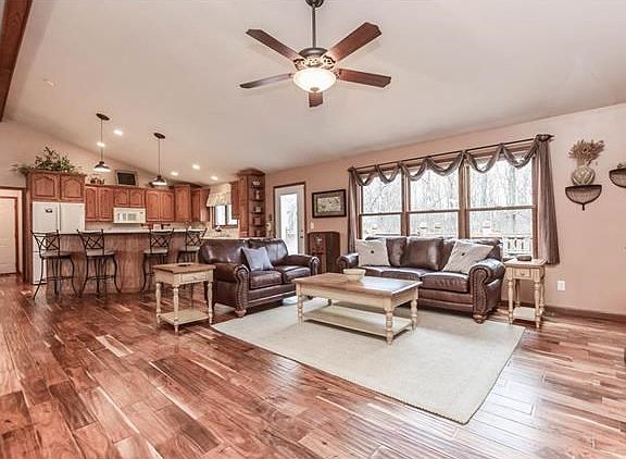 Gleaming hardwood floors throughout the living room, kitchen & hallways and gorgeous views of the backyard