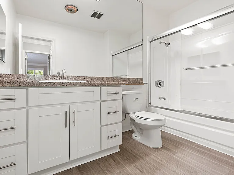 Modern styled bathroom with shower and tub.