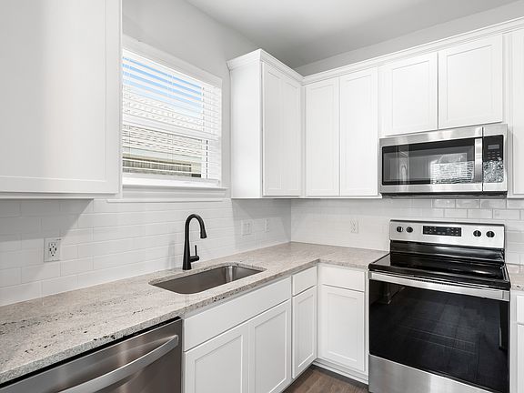 The kitchen of the Blanco has sprawling granite countertops.