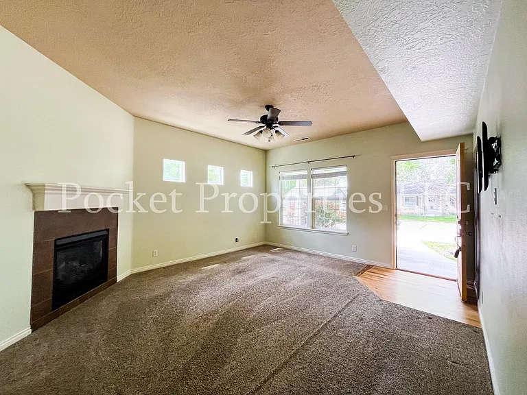 Entryway living room with fireplace