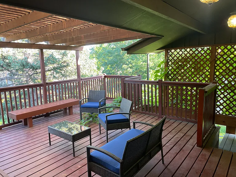 Deck area--covered--off of the kitchen/dining areas.