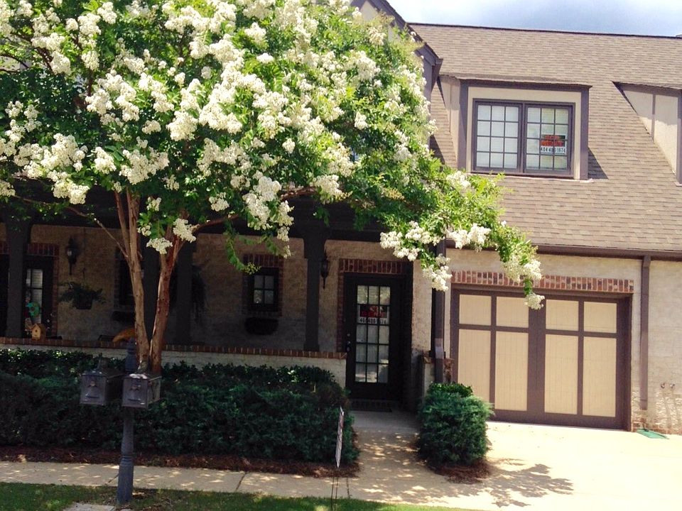 Front of townhouse with covered front porch