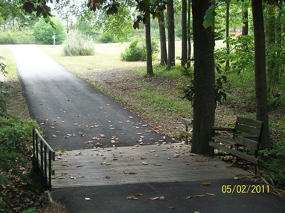 Country/Vintage Bridge w/creek and driveway facing the road