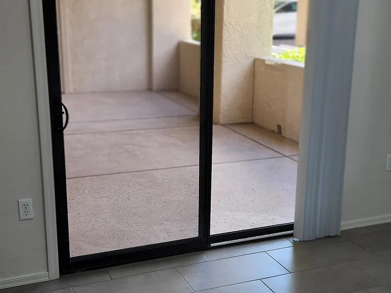 second bedroom/office, view of patio