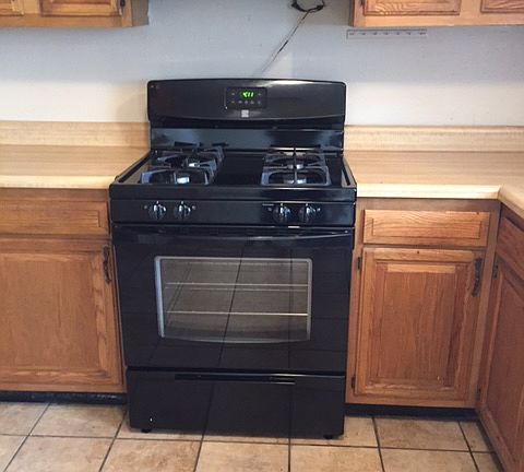 NEW gas stove 