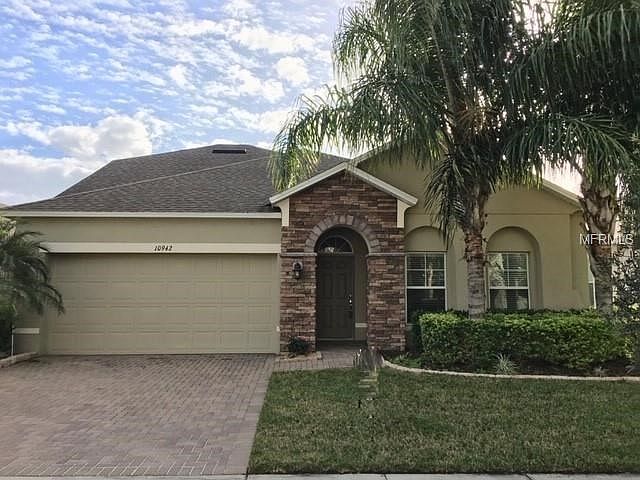 WATERFRONT Home in Gated Woodland Lakes Preserve!