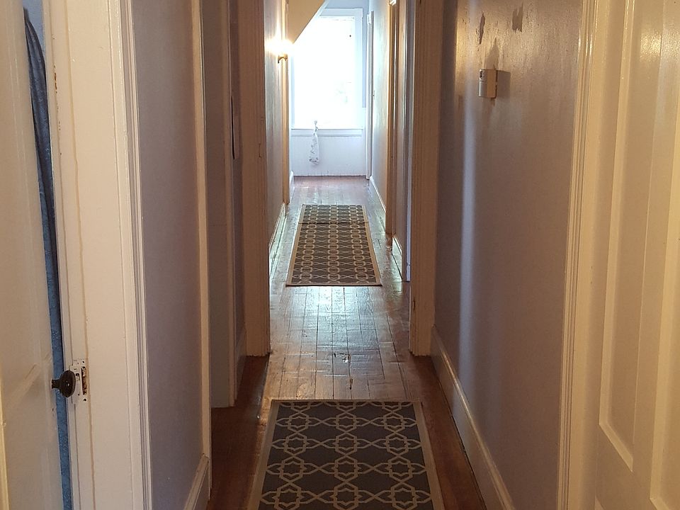 long 35 foot hallway connecting all rooms