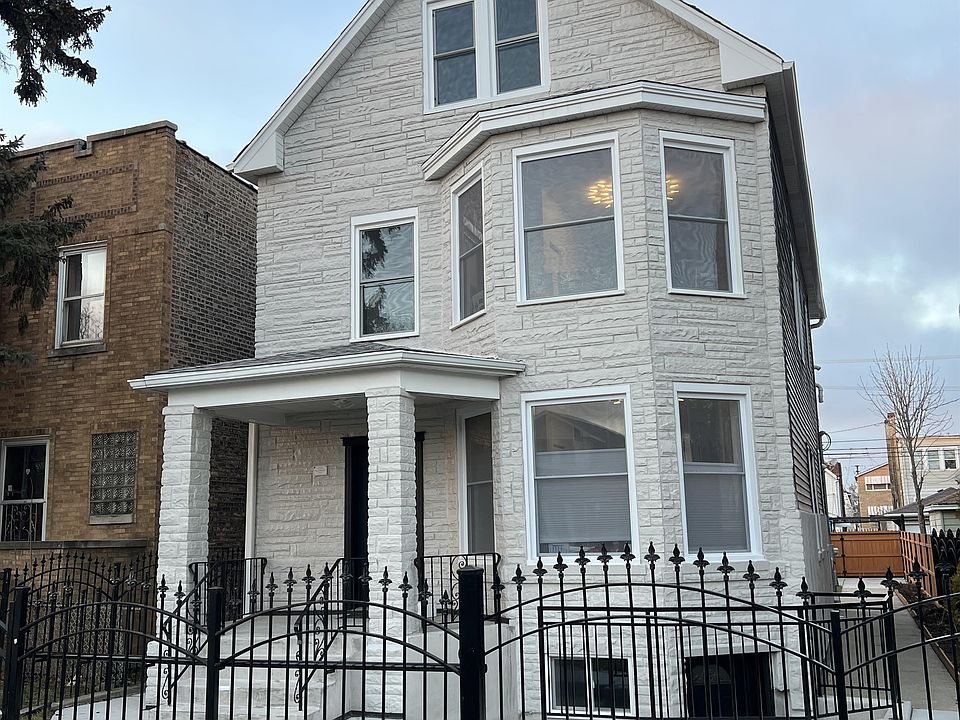1st image of 5148 W Henderson St Unit 3
