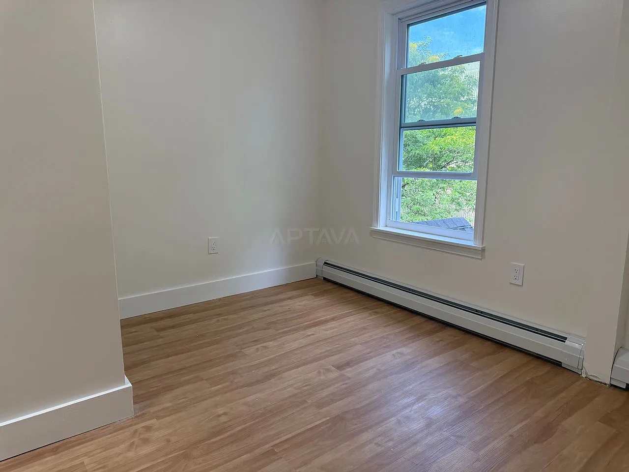 Sunny & Bright Renovated Top-Floor Unit | In-Unit Laundry — Photo 3