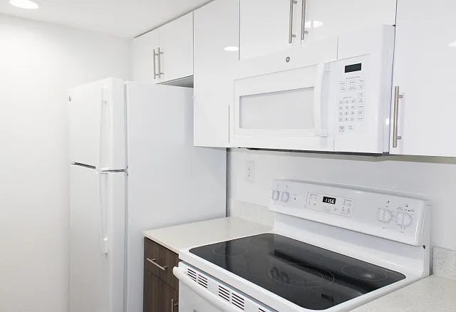 Kitchen with Quartz Countertops & Two-Toned Cabinetry