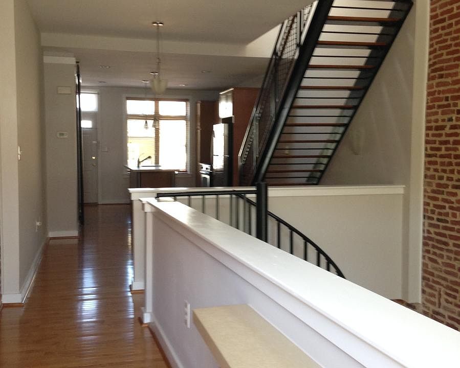 Entry with view of dining and kitchen