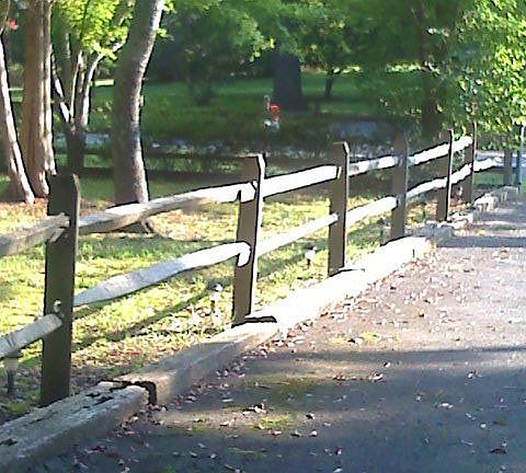 Wooded, lighted, fenced driveway with gated yard!