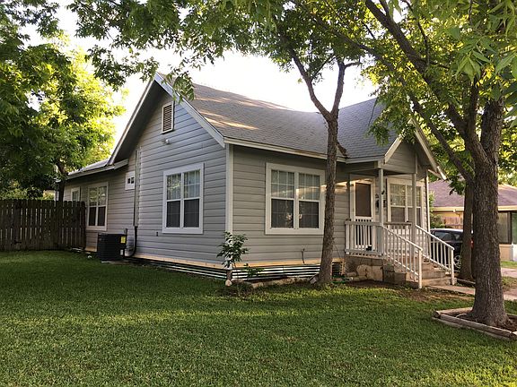 Side of the house/ Front yard. 