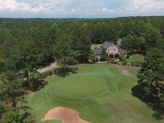 12th green in back yard view