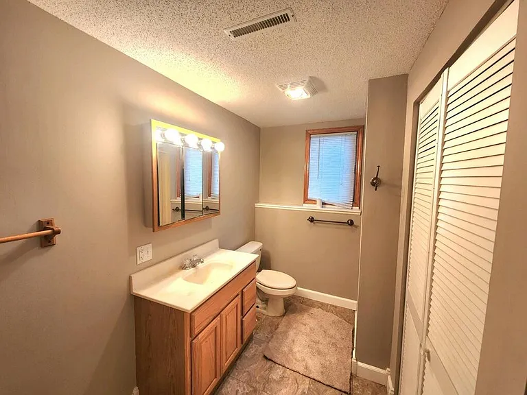 Finished bathroom in lower level.